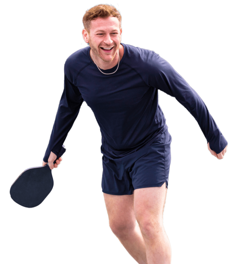 pickleball-courts-near-me-peak-id-gym-post-falls-revised a male gym member plays pickleball at peak id gym in post falls