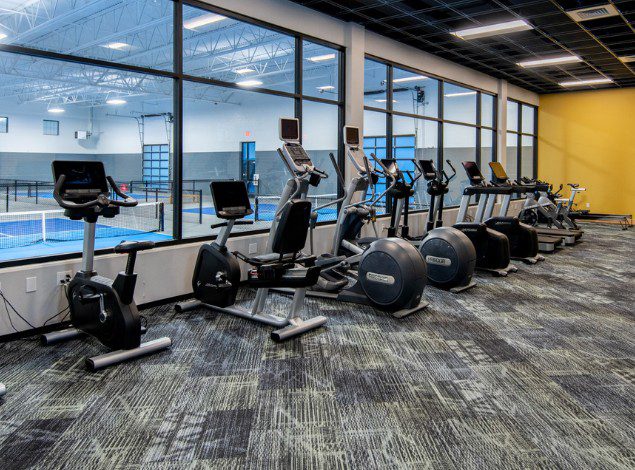 best-cardio-equipment-near-me-peak-id-gyms-post-falls-mobile a row of cardio training equipment at peak id gym in post falls