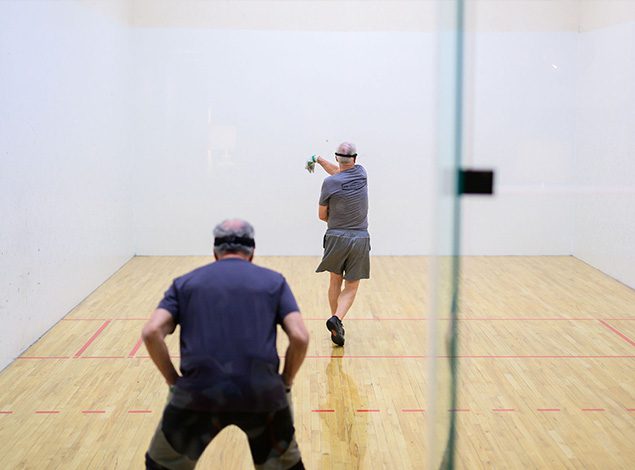 people playing racquetball
