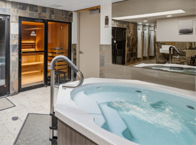 Hot tub, sauna, and steam room in the recovery area at Peak Health & Wellness Coeur d'Alene.