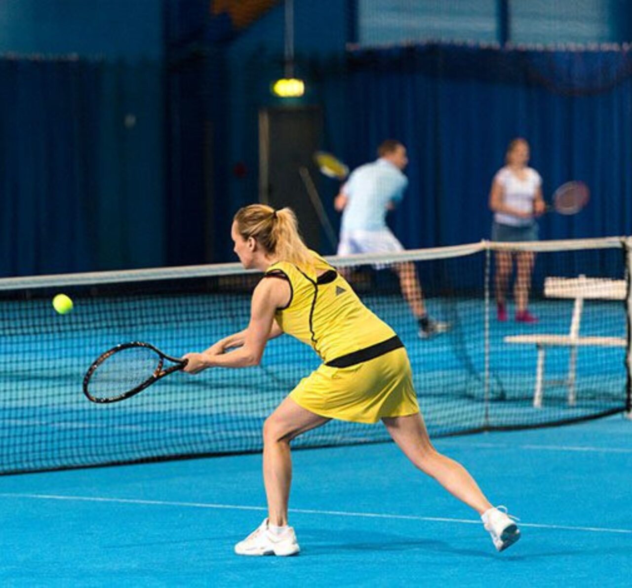 Members at the best gym near you participating in a tennis tournament at Peak Health & Fitness Hayden