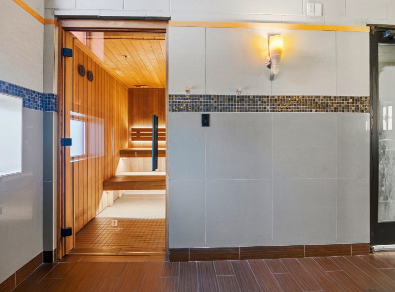 Entrance to the wooden sauna in the recovery area at Peak Health & Wellness Hayden.