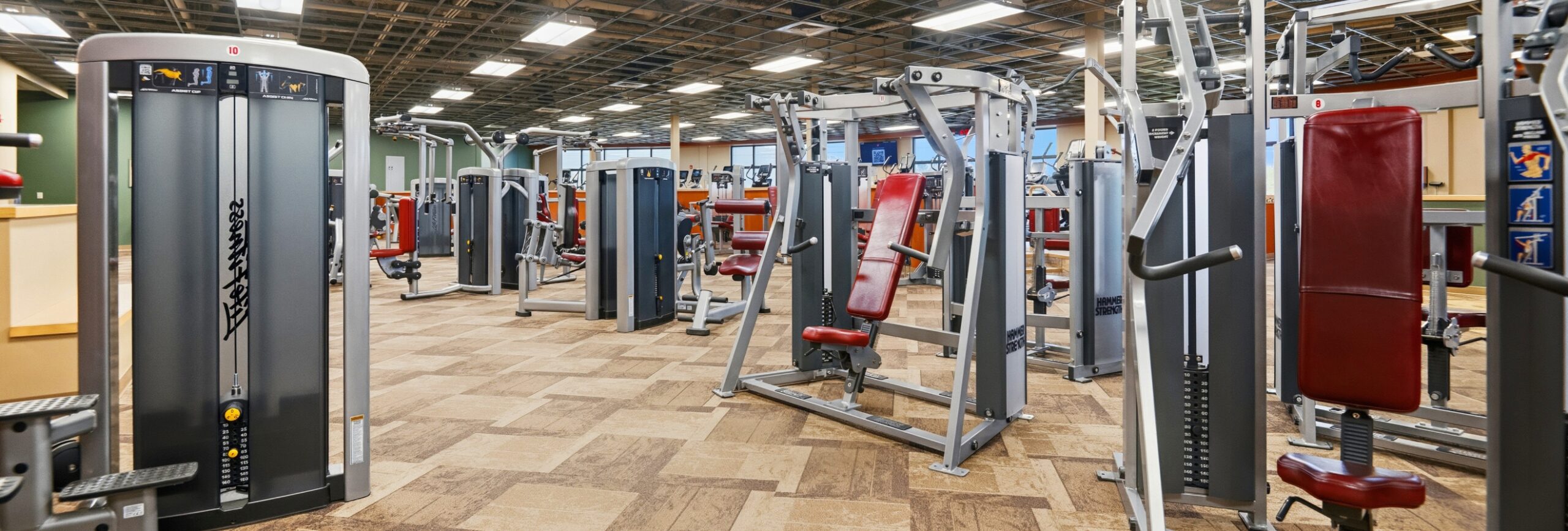 Strength training floor with selectorized weight machines at Peak Health & Wellness Hayden.