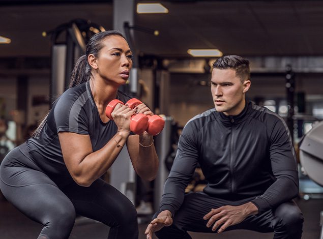 certified personal trainers in a modern gym
