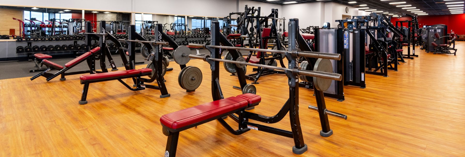 a strength training area with free weights at peak health gym in post falls idaho