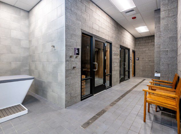 a clean and spacious locker room with sauna at peak health gym in post falls idaho