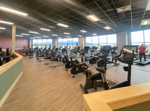 a row of cardio training equipment at peak health gym near me in post falls idaho