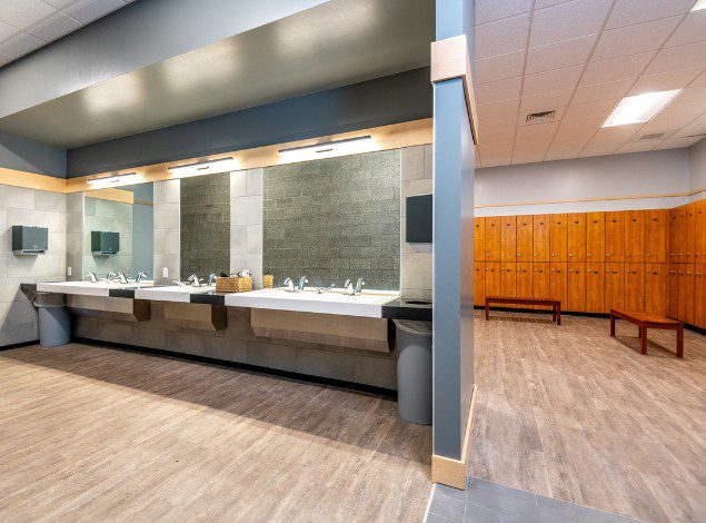 a clean locker room and sink area at the new post falls location peak health gym in idaho