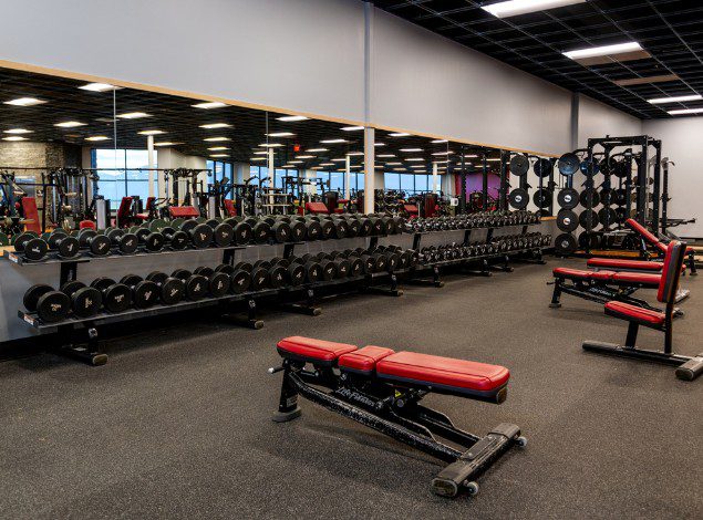 a row of free weight dumbbells for strength training at a gym near me in post falls idaho