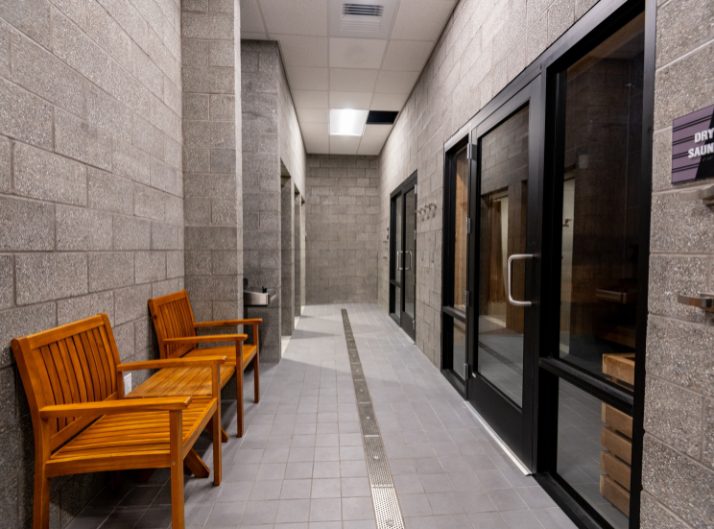 Sauna entrance and relaxation seating in the recovery area at Peak Health & Wellness Post Falls.