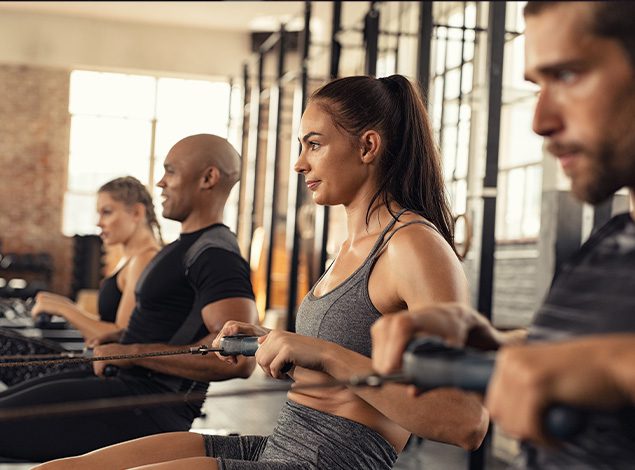 group of people working out with a trainer